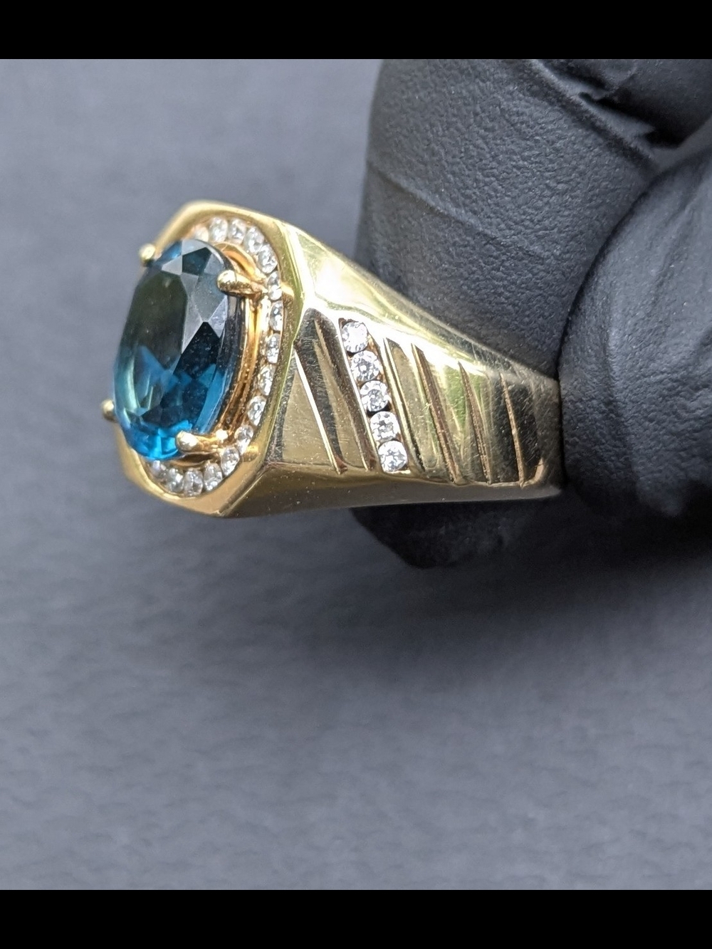 Helzberg Diamonds Gold Ring with Blue Center Stone and Halo - Picture 5 of 12